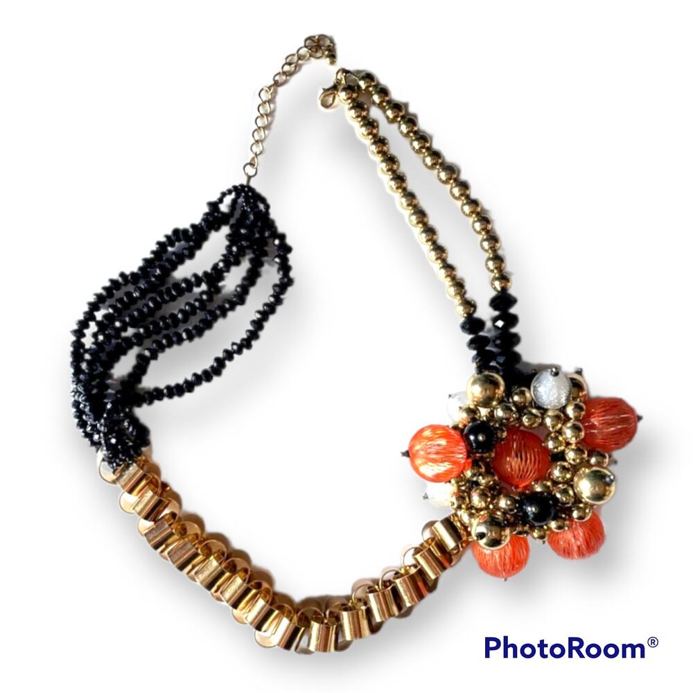 Black, orange, and gold-tone mixed materials heavy statement necklace set